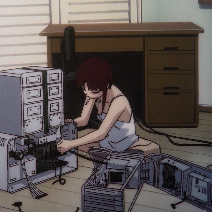 Anime character assembling computer hardware on the floor