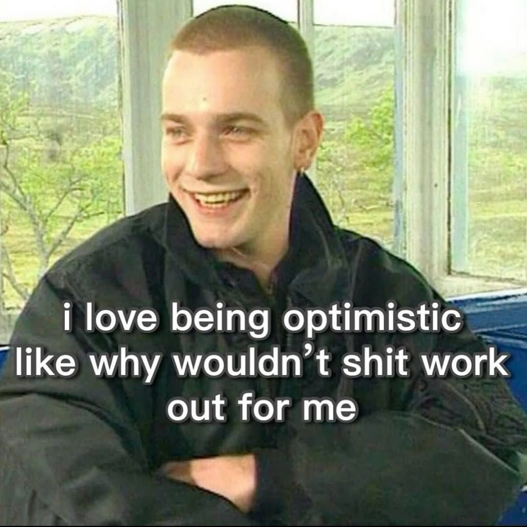 A smiling man with a caption about being optimistic